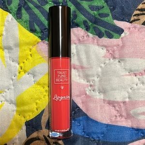 TRUST FUND BEAUTY
Lipgasm Lip Gloss